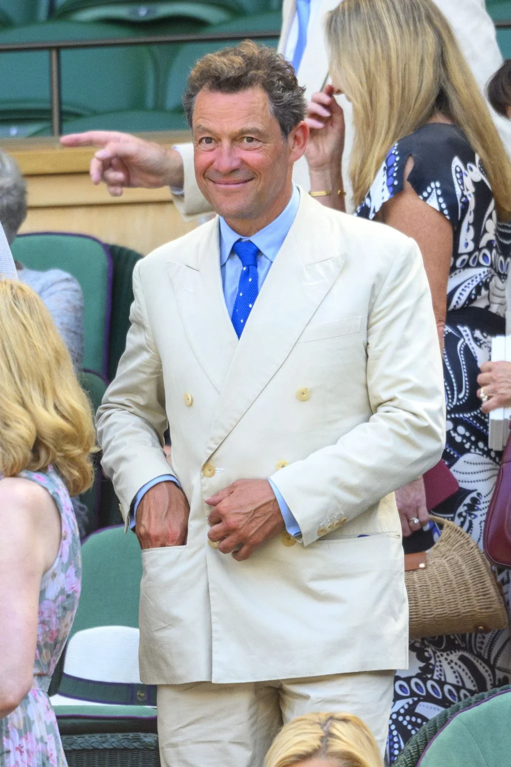 Image may contain Dominic West Blazer Clothing Coat Jacket Formal Wear Suit Accessories Tie Face Head and Person