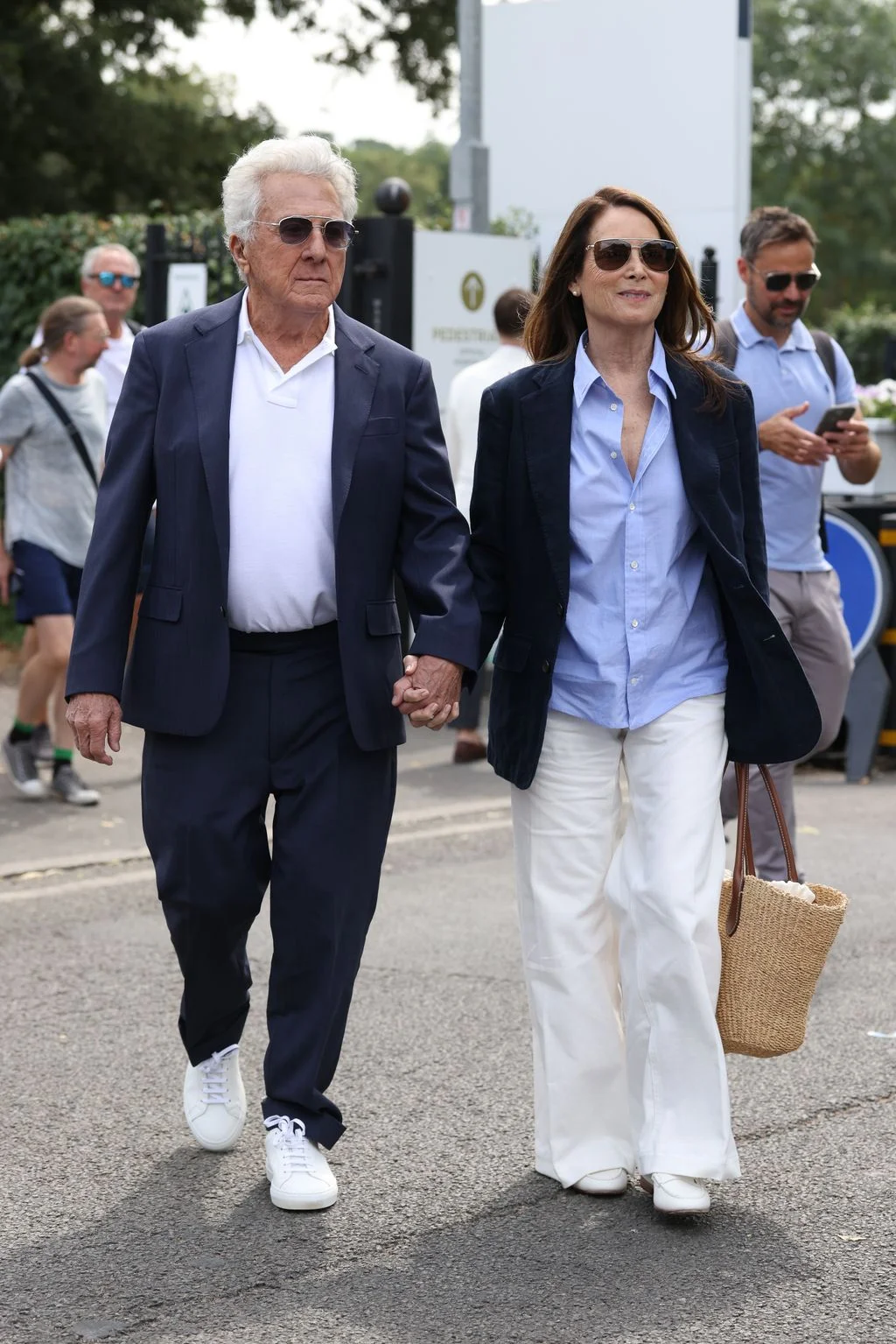 Image may contain Dustin Hoffman Person Walking Body Part Hand Blazer Clothing Coat Jacket Adult and People