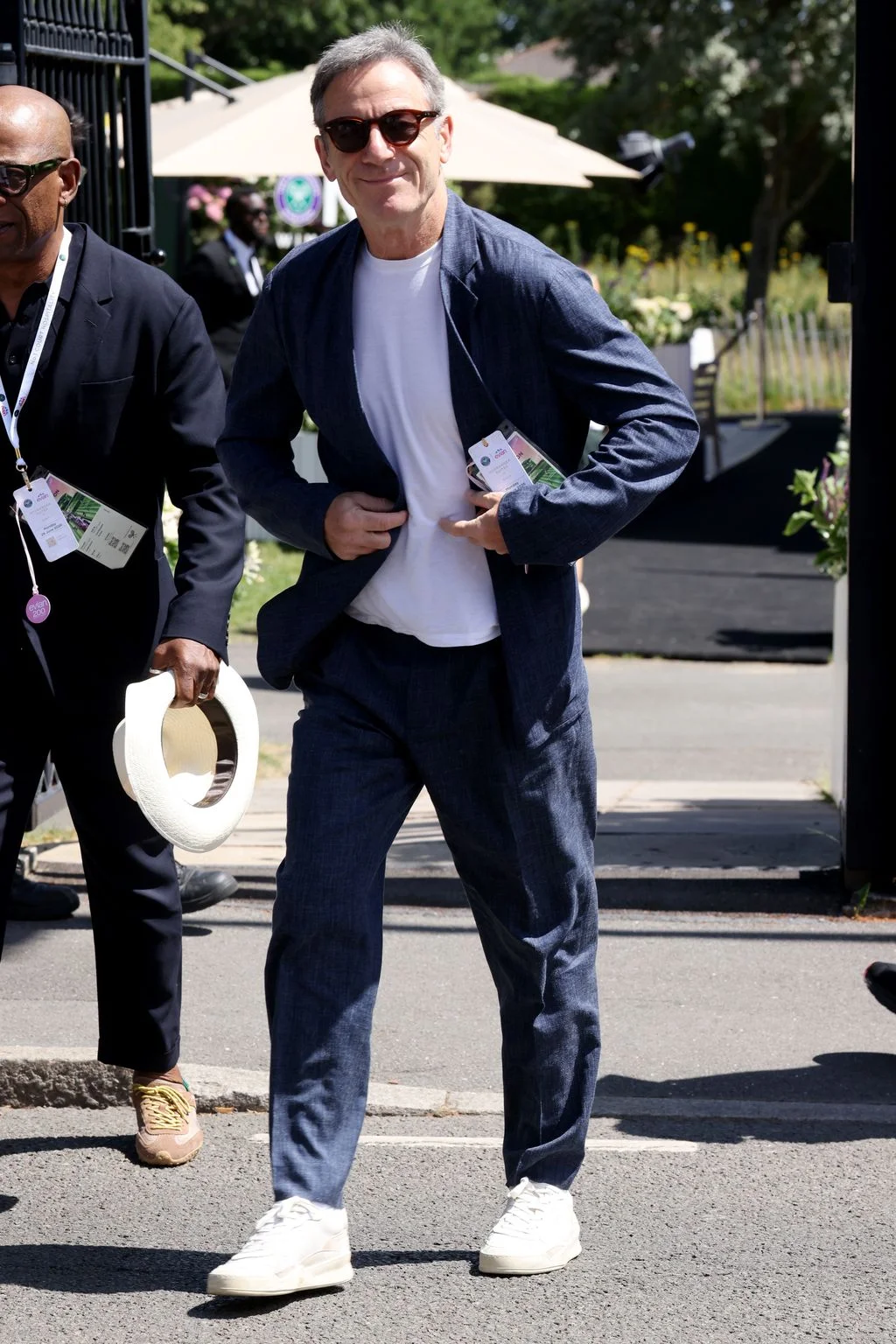 Image may contain Jason Isaacs Lennie James Clothing Formal Wear Suit Person Walking Blazer Coat Jacket and Adult