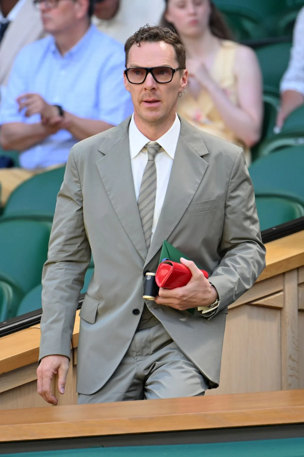 Image may contain Benedict Cumberbatch Blazer Clothing Coat Jacket Flower Plant Rose Formal Wear and Suit
