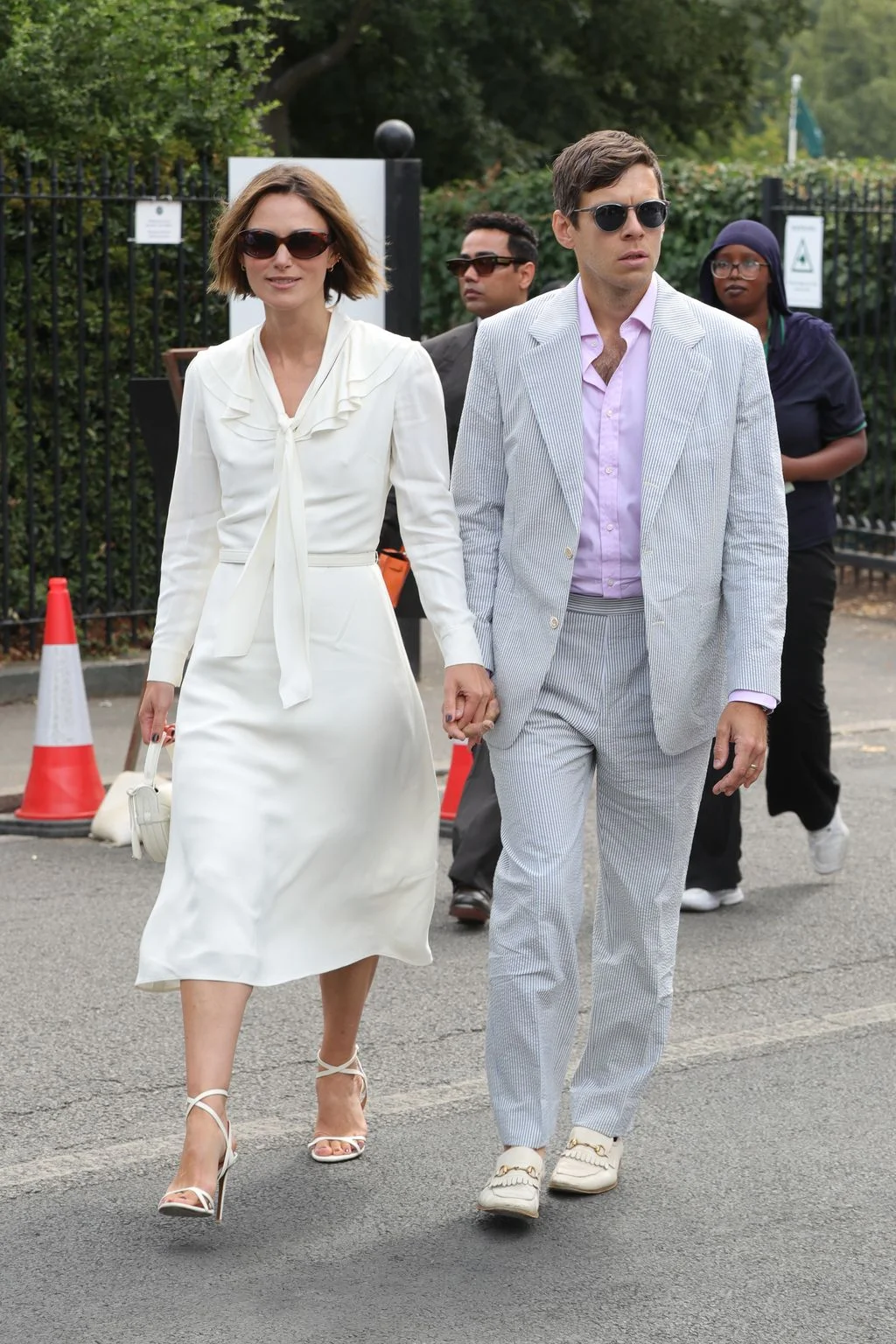 Image may contain James Righton Keira Knightley Benyamin Nuss Body Part Hand Person Adult Holding Hands and Clothing