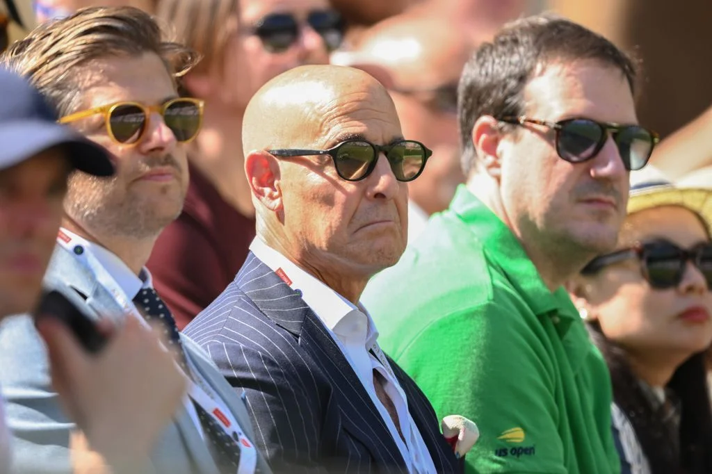 Image may contain Stanley Tucci Accessories Sunglasses Face Head Person Photography Portrait and Clothing