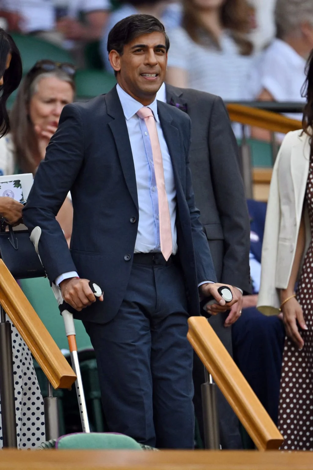 Image may contain Rishi Sunak Blazer Clothing Coat Jacket Formal Wear Suit Accessories Tie Adult and Person