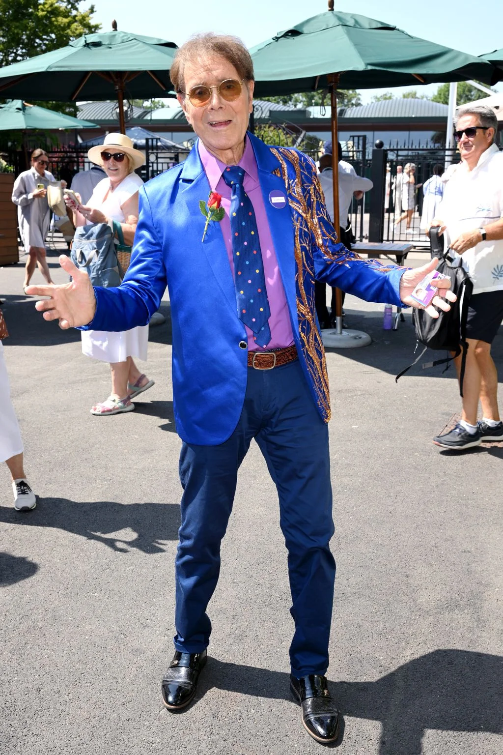 Image may contain Cliff Richard Wayne Hussey Accessories Formal Wear Tie Clothing Suit Adult Person Face and Head