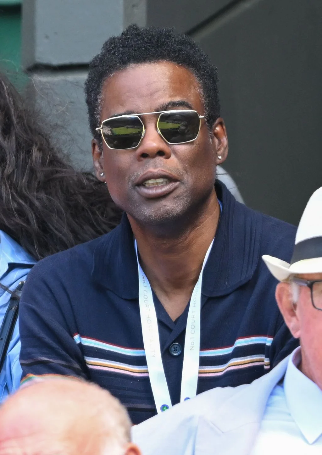 Image may contain Chris Rock Accessories Sunglasses Face Head Person Photography Portrait Glasses and Body Part