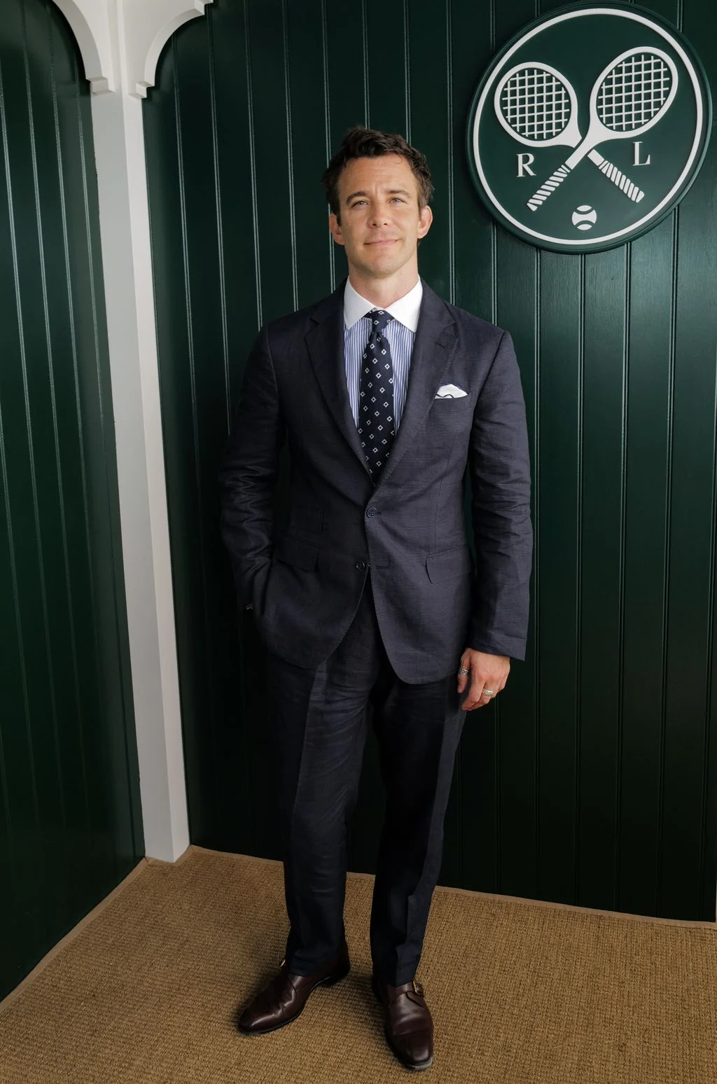 Image may contain Richard Ruccolo Clothing Formal Wear Suit Blazer Coat Jacket Accessories Tie Adult and Person