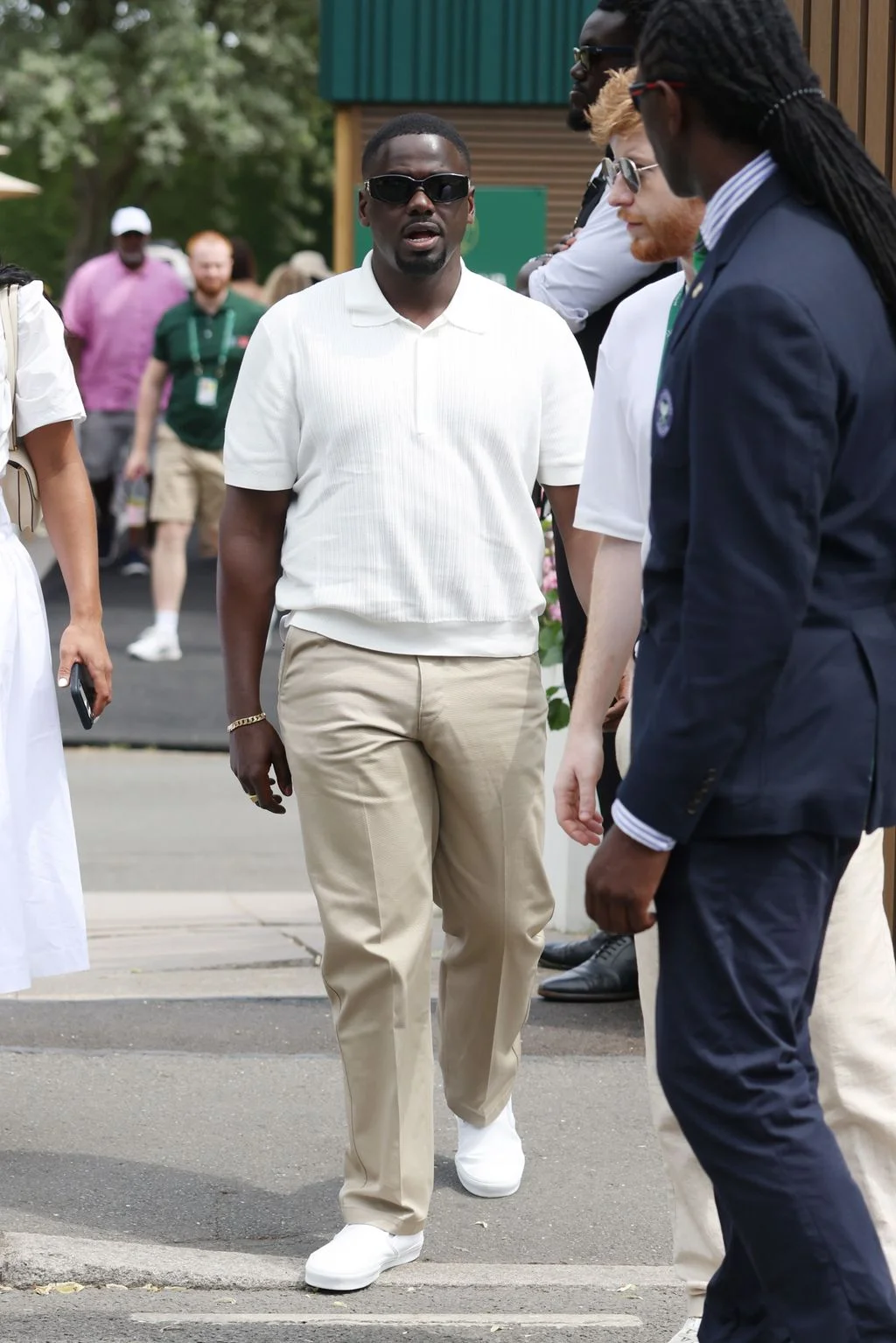 Image may contain Daniel Kaluuya Bear Pascoe Pedestrian Person Accessories Bracelet Jewelry Glasses and Clothing