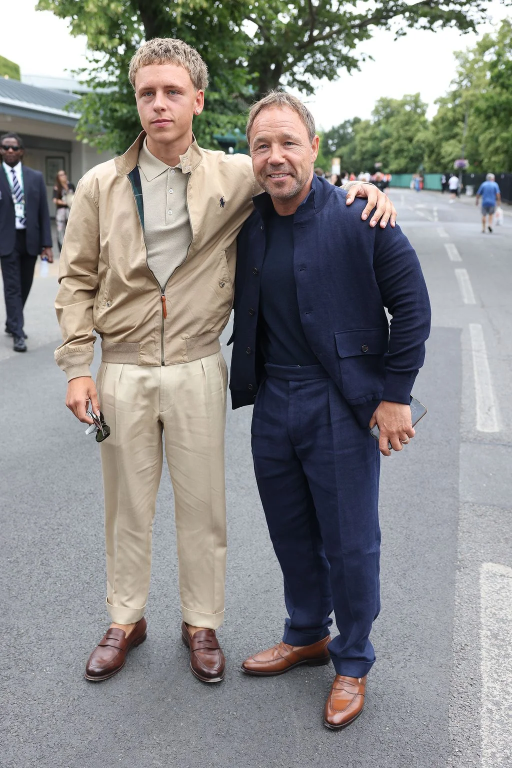 Image may contain Stephen Graham Blazer Clothing Coat Jacket Pants People Person Adult Face Head and Photography