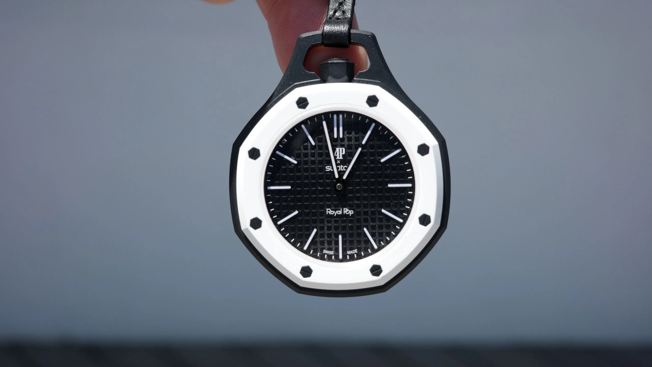 Image may contain Wristwatch Arm Body Part and Person