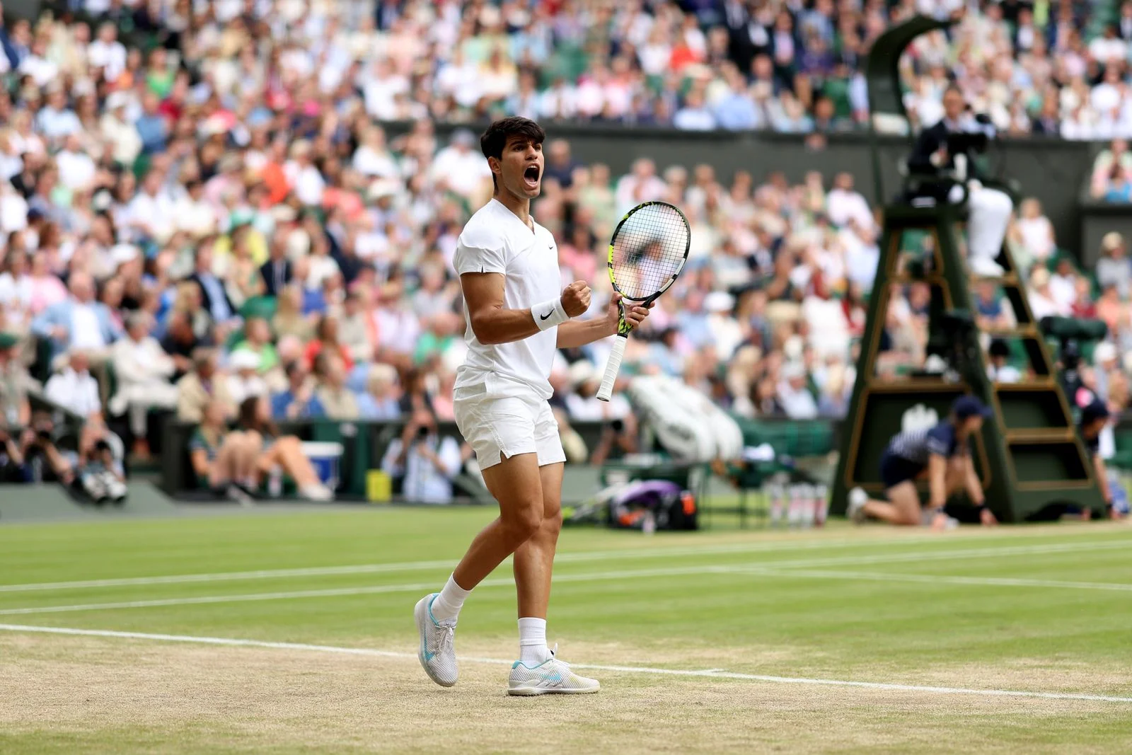 Image may contain Greg Garza Adult Person Racket Sport Tennis Tennis Racket Clothing and Shorts