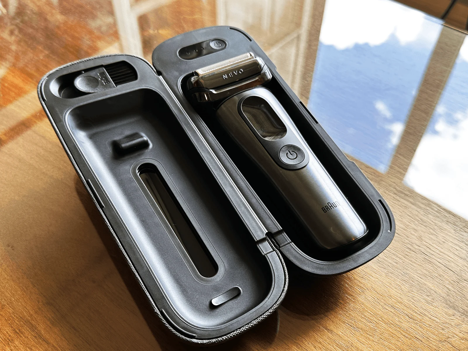 Image may contain Electronics Mobile Phone Phone Gun and Weapon