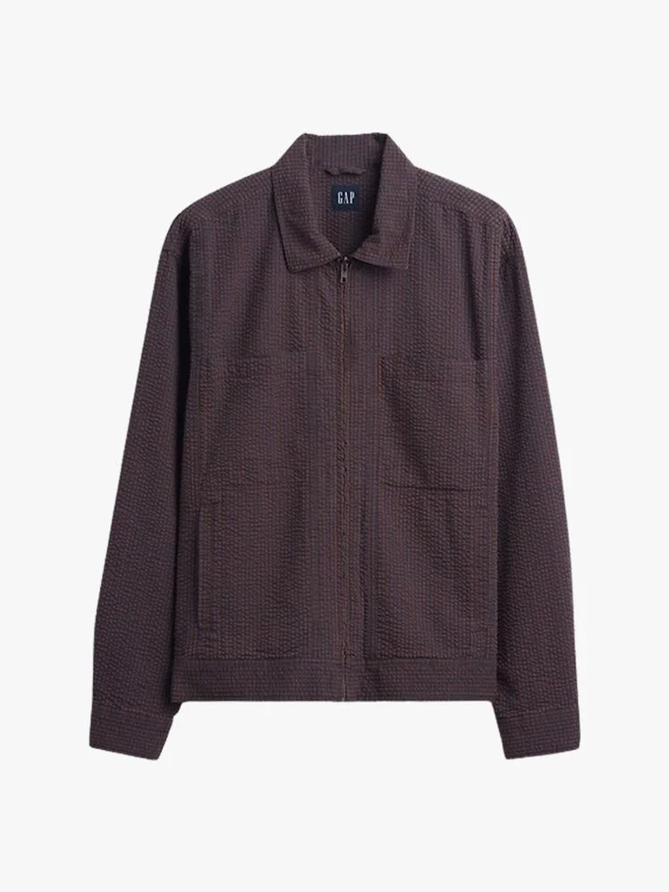 Image may contain Clothing Coat Jacket Long Sleeve Sleeve Fleece Knitwear and Sweater