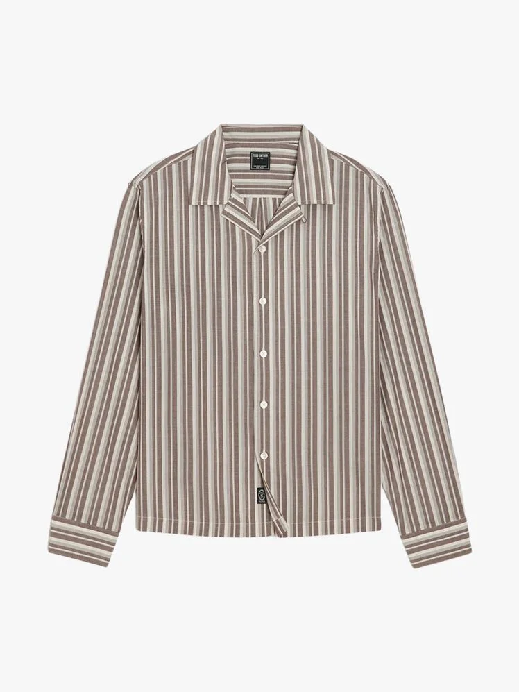 Image may contain Clothing Shirt Long Sleeve Sleeve and Dress Shirt