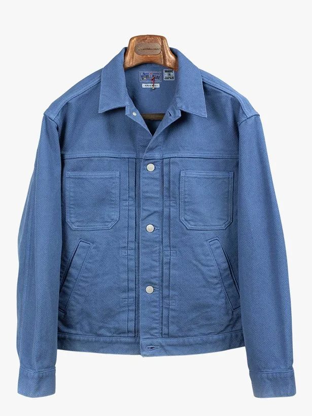 Image may contain Clothing Coat Jacket Pants Long Sleeve Sleeve and Jeans