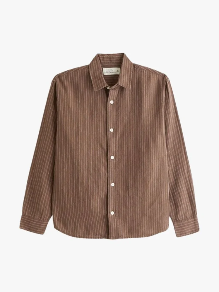 Image may contain Clothing Shirt Long Sleeve Sleeve and Dress Shirt