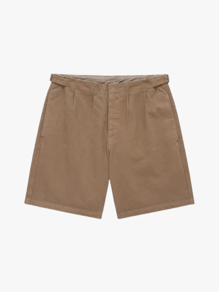 Image may contain Clothing Shorts Skirt and Khaki