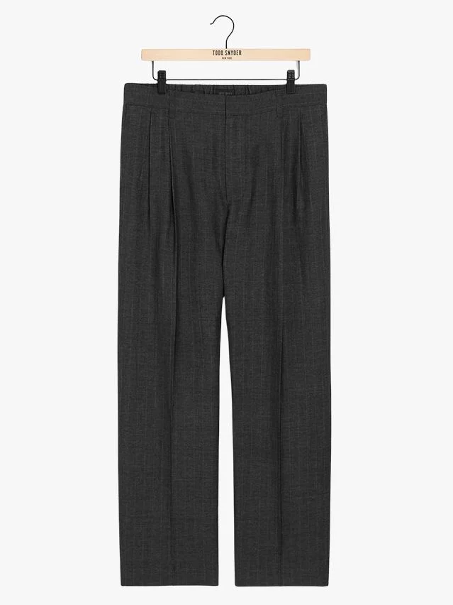 Image may contain Clothing Pants Home Decor Linen and Jeans