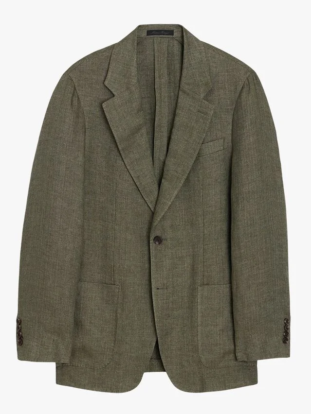Image may contain Blazer Clothing Coat Jacket Home Decor Linen Formal Wear and Suit