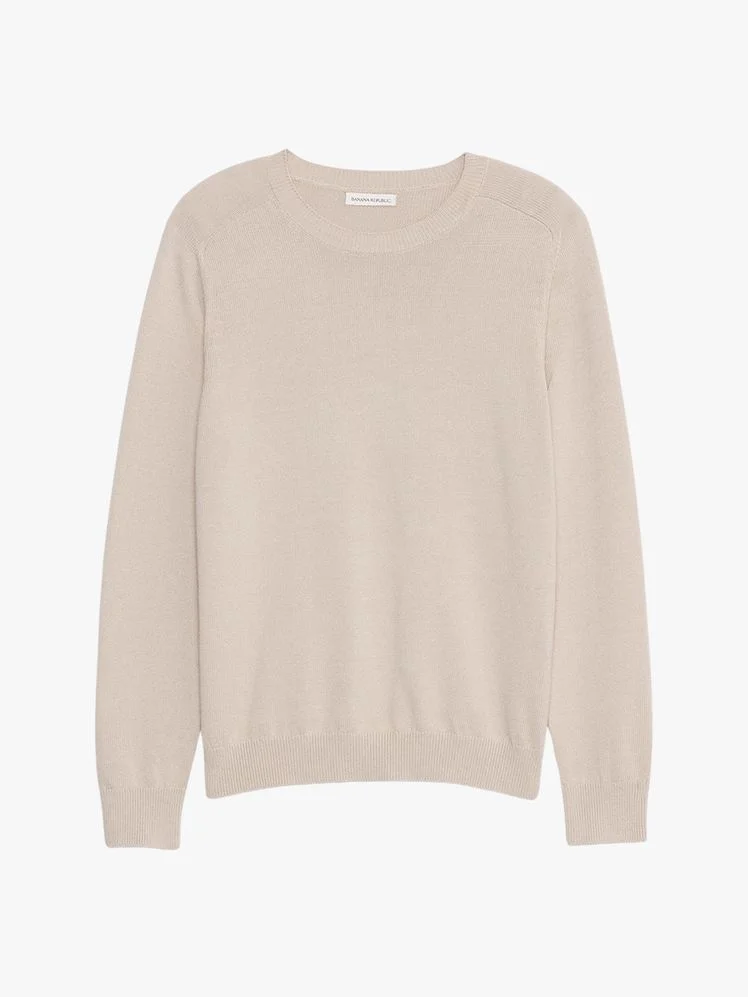 Image may contain Clothing Knitwear Sweater Sweatshirt Long Sleeve and Sleeve