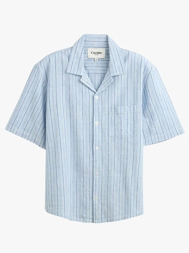 Image may contain Clothing Shirt Sleeve Long Sleeve and Dress Shirt