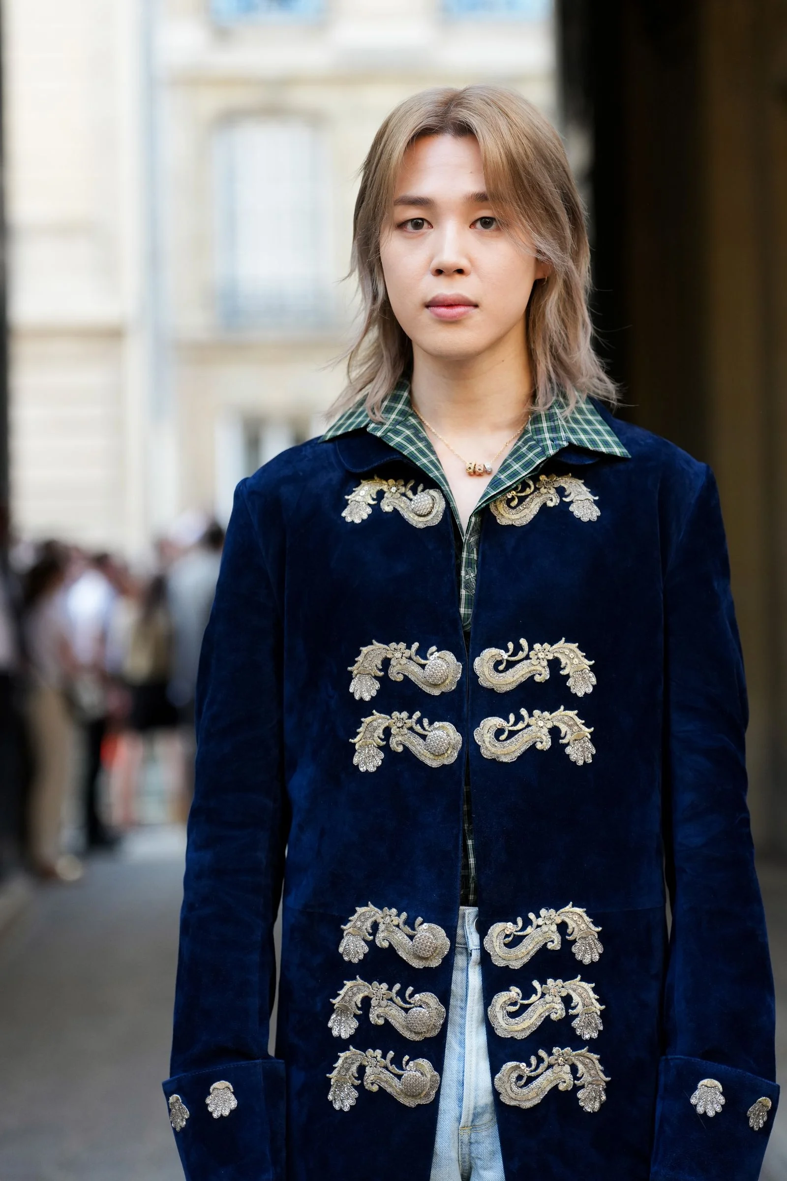 Image may contain Clothing Coat Jacket Person Adult Blazer Velvet Blonde Hair Face Head Photography and Portrait