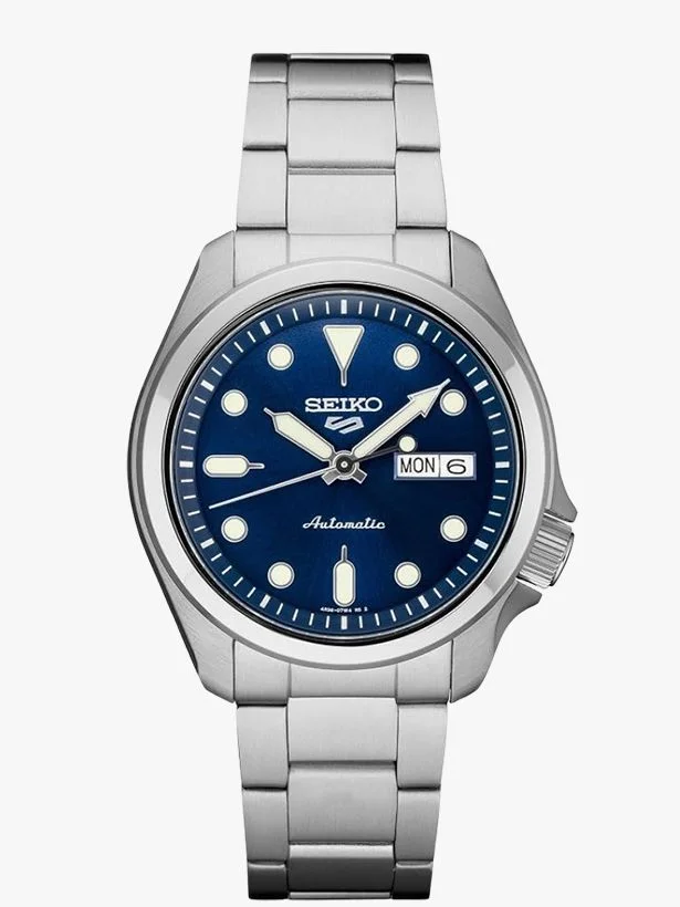 Image may contain: Wristwatch, Arm, Body Part, and Person