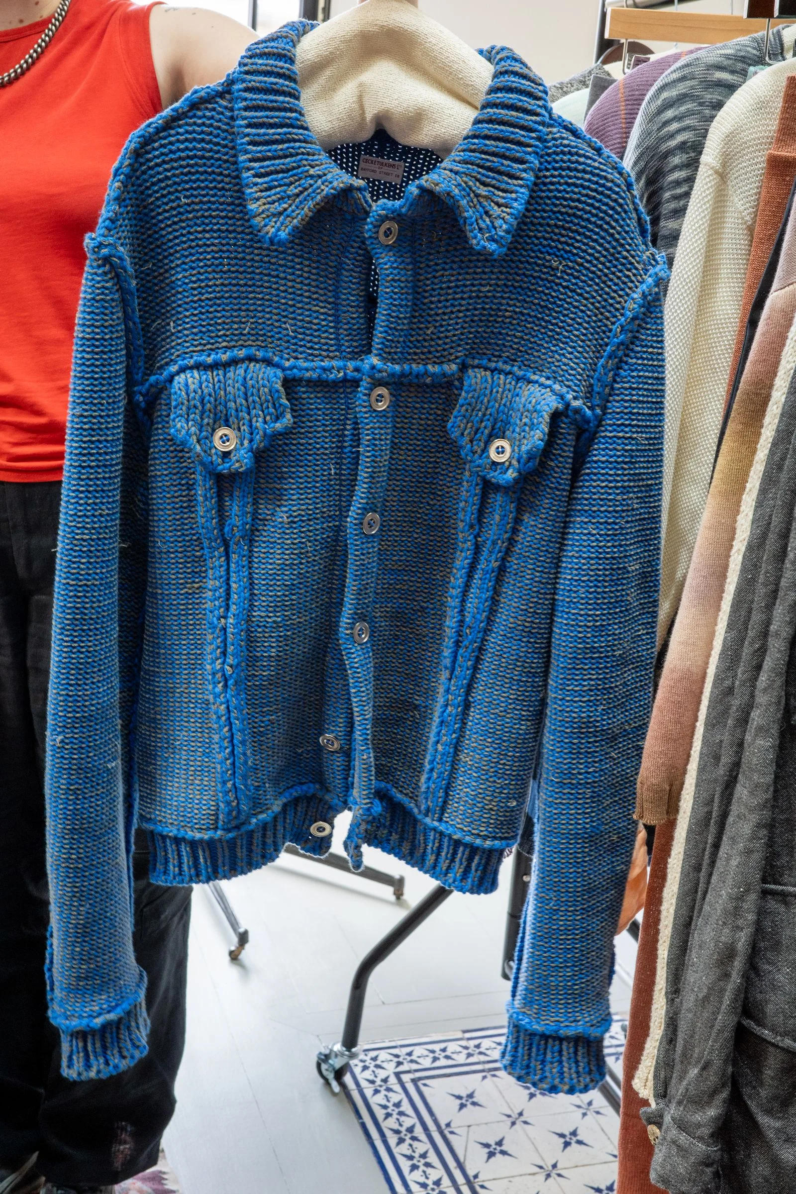 A blue knitted sweater