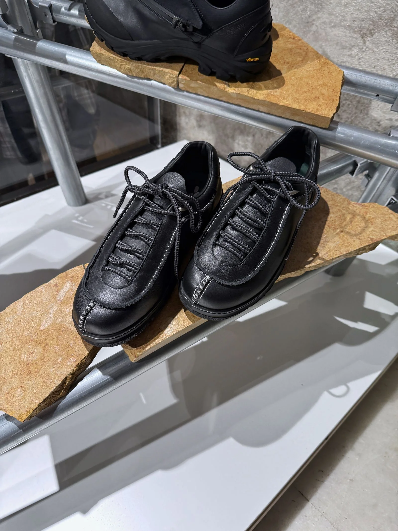 A pair of black sneakers