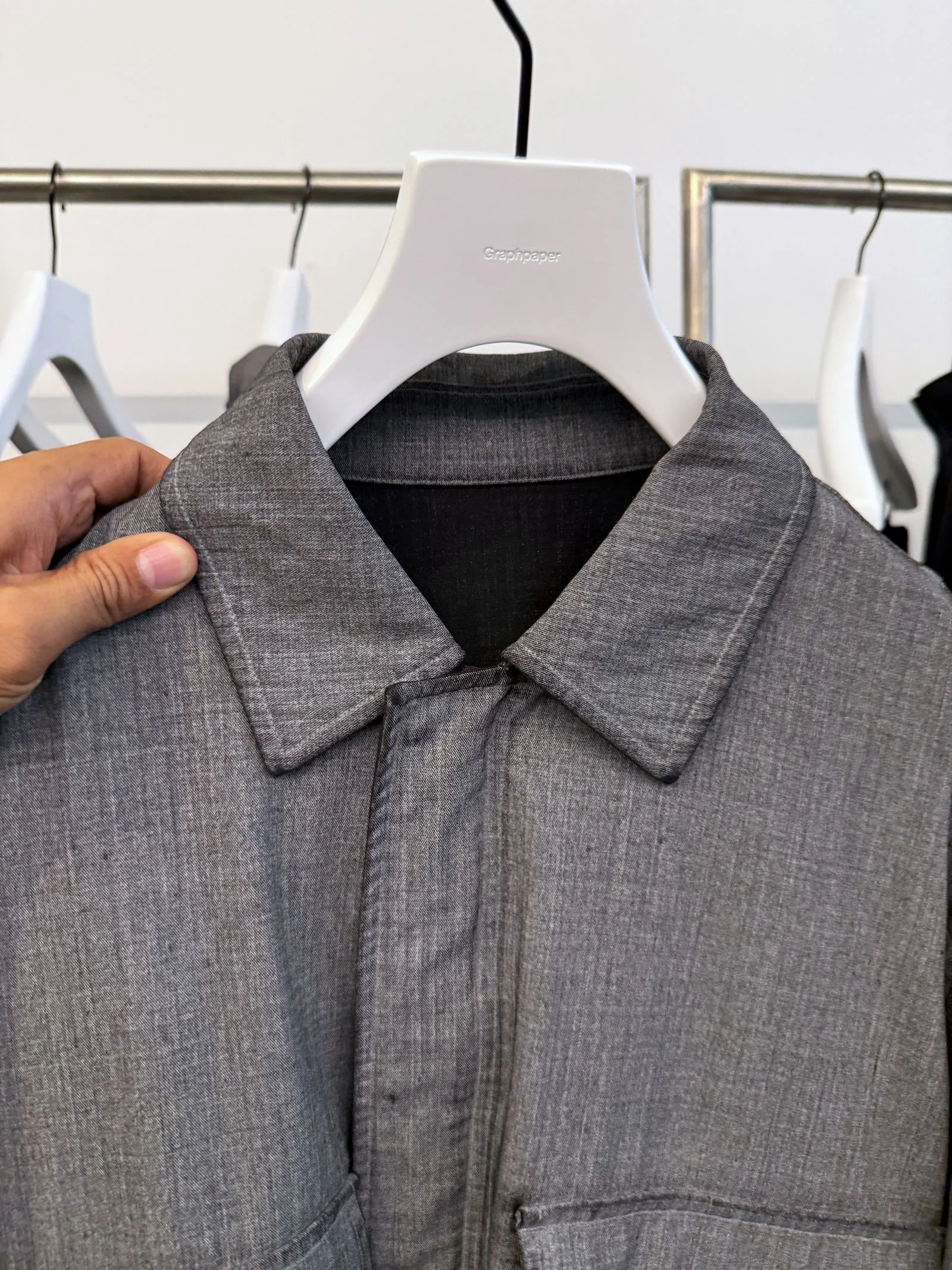 A closeup of the same gray jacket