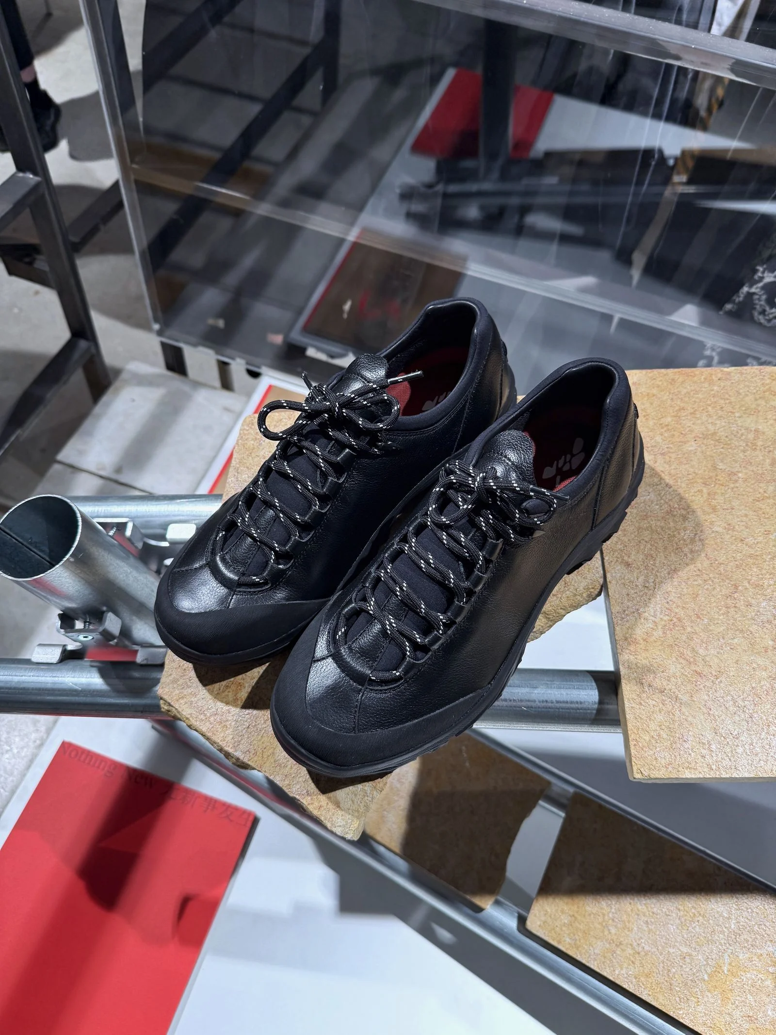 A pair of black sneakers