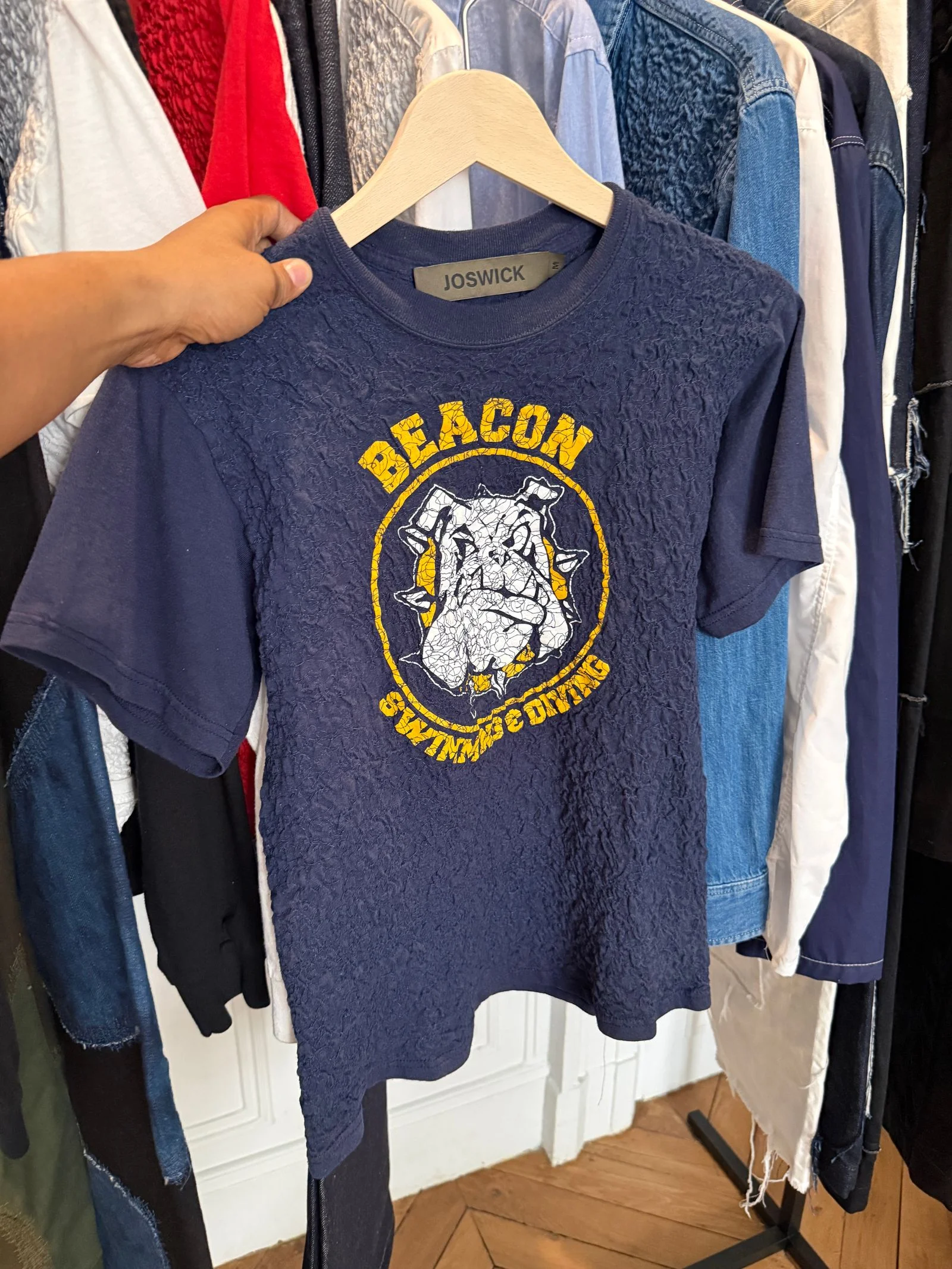 A crinkled graphic tshirt featuring a bulldog illustration