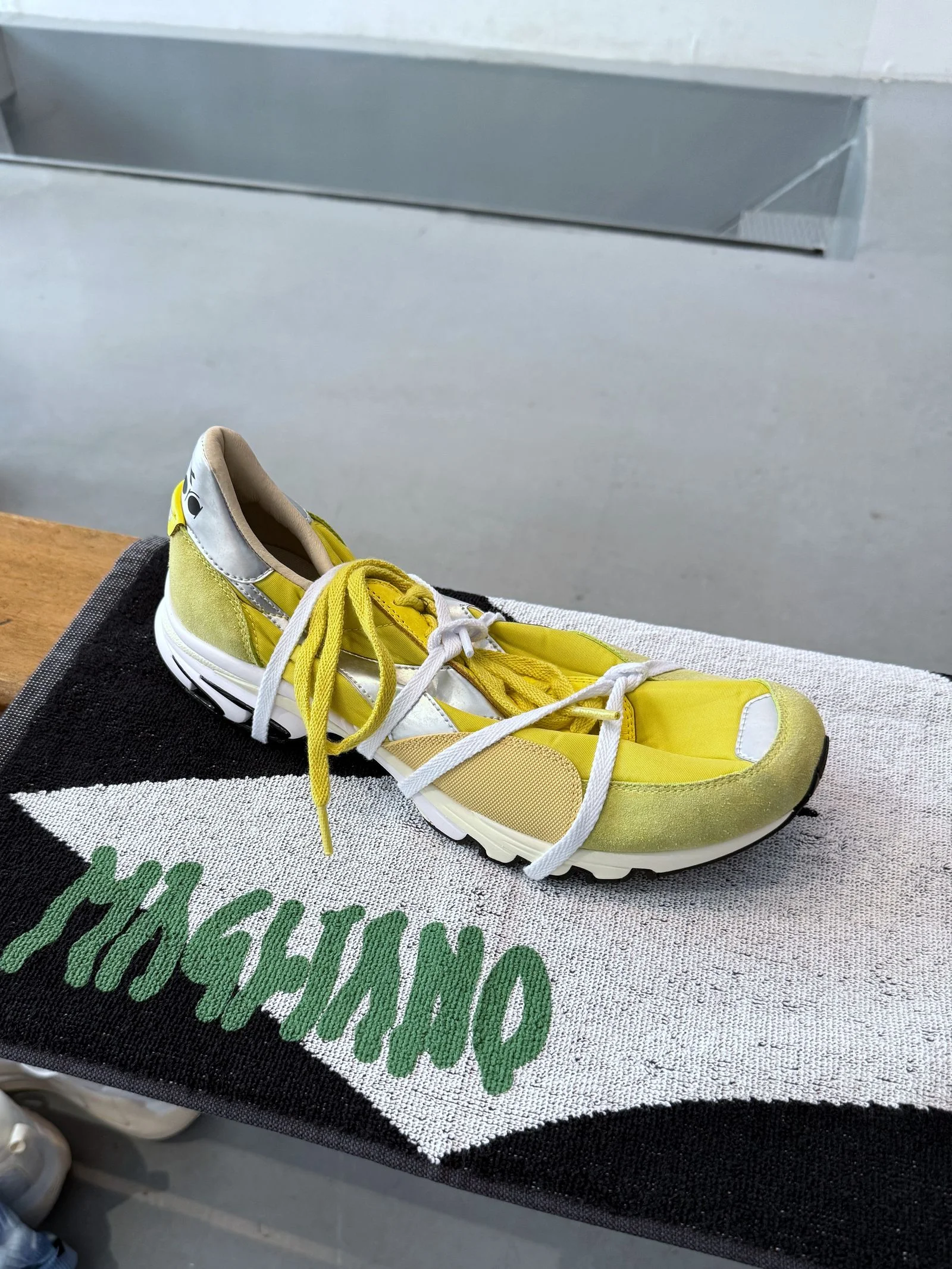 A yellow sneaker