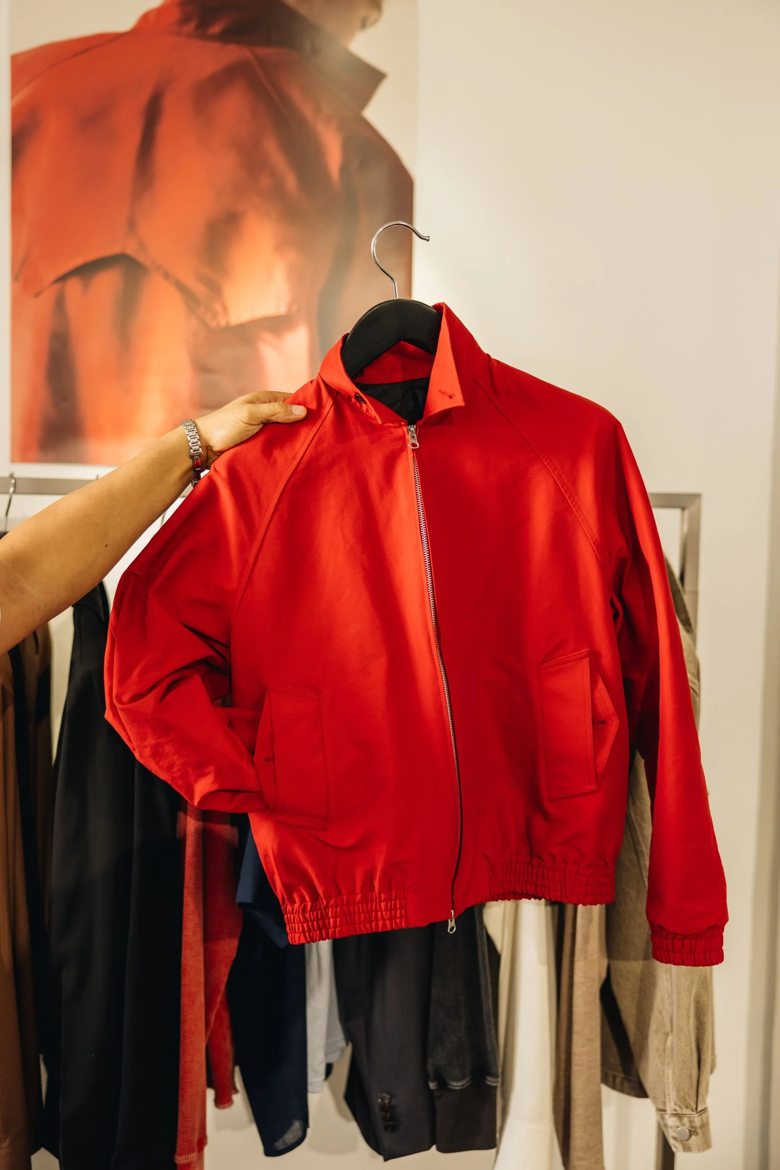 A red jacket on a hanger