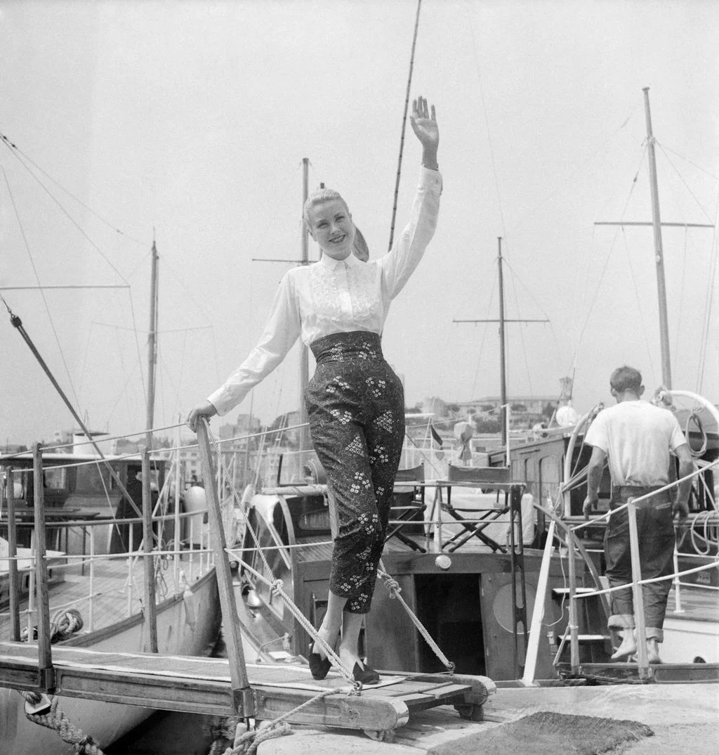 Image may contain Grace Kelly Water Waterfront Port Transportation Vehicle Yacht Adult Person Face and Head