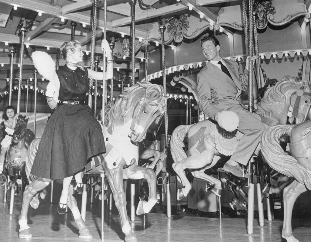 Image may contain JeanPierre Aumont Grace Kelly Play Amusement Park Adult Person Carousel Accessories and Jewelry