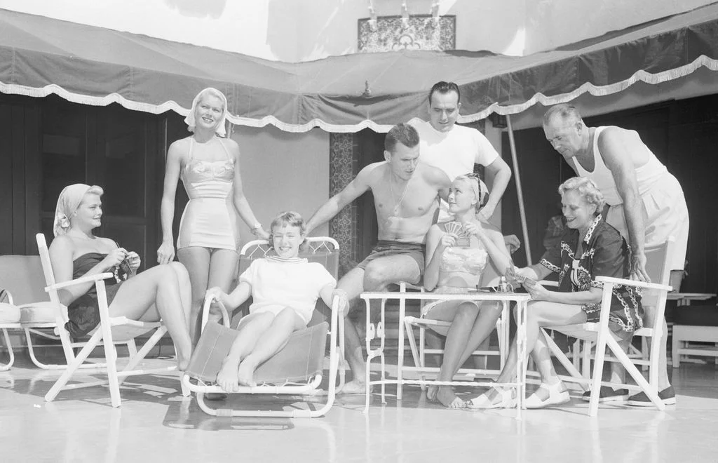 Image may contain Grace Kelly Clothing Shorts Face Head Person Photography Portrait Child Accessories and Bag