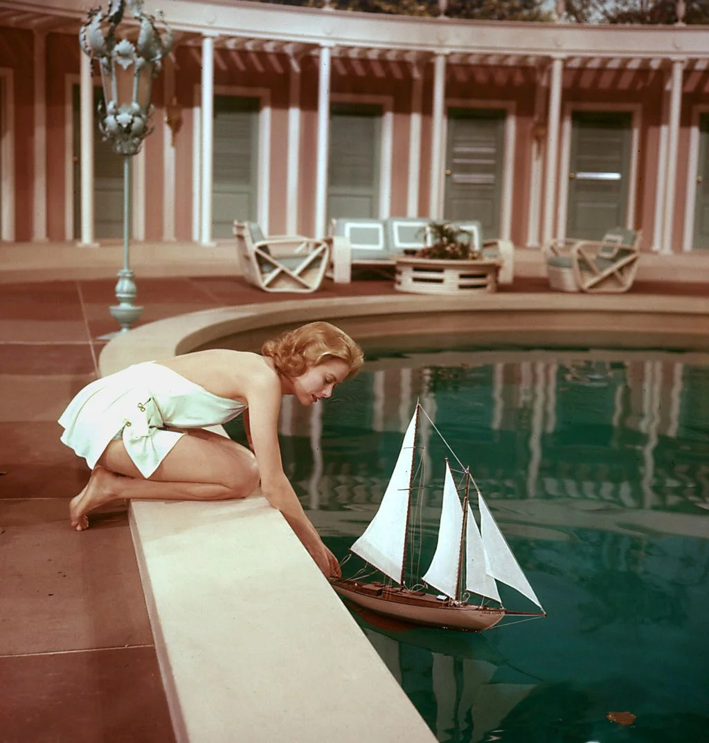 Image may contain Grace Kelly Boat Sailboat Transportation Vehicle Yacht Clothing Shorts Water Waterfront and Face
