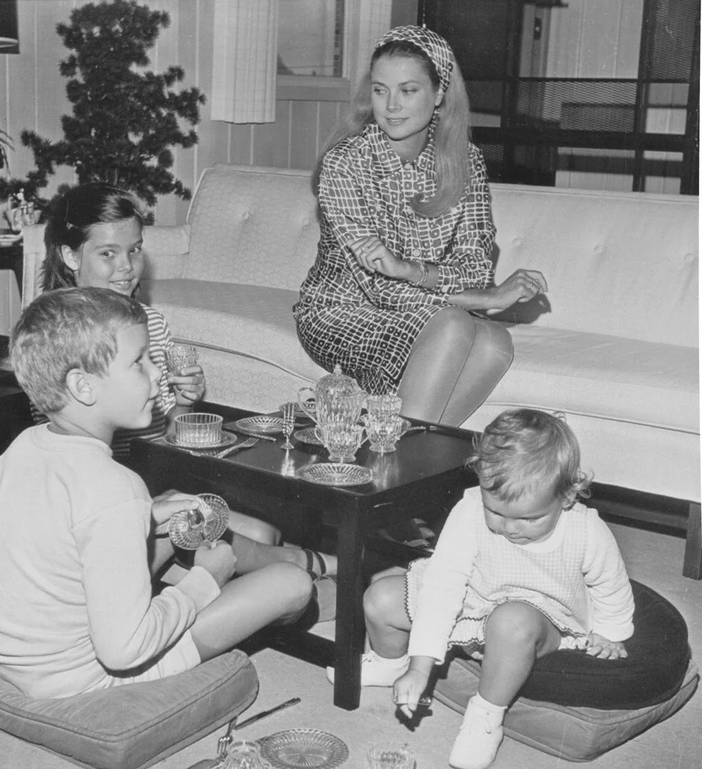 Image may contain Caroline Princess of Hanover Grace Kelly Couch Furniture Table Architecture Building and Indoors