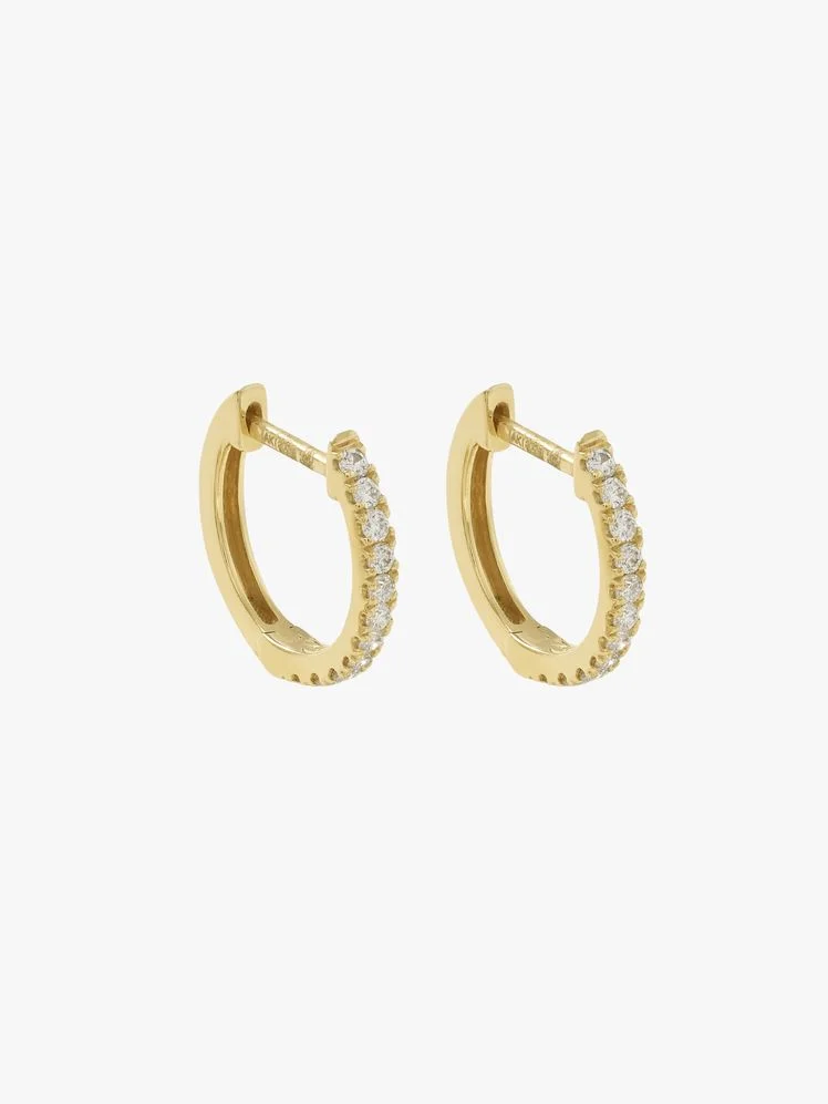 Image may contain: Accessories, Earring, Jewelry, Diamond, Gemstone, and Gold