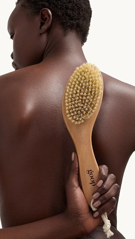 Image may contain Brush Device Tool Adult Person Body Part Face Head and Neck