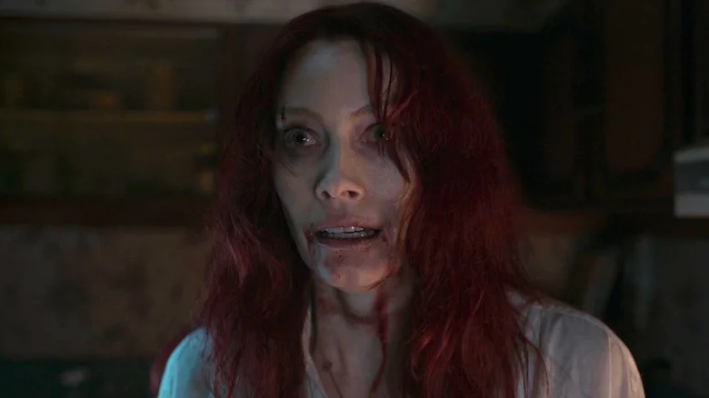 Deadite Ellie pretending to be worried in Evil Dead Rise