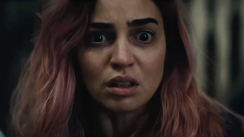 Alice looking alarmed and horrified in Evil Dead Burn