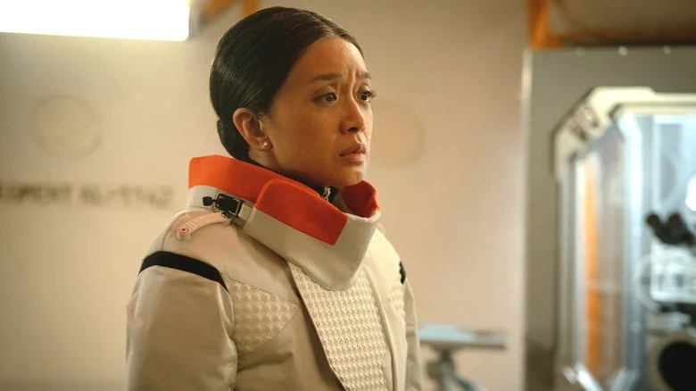 Cynthy Wu as Kelly Baldwin wearing an astronaut suit inside a laboratory in For All Mankind
