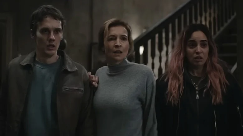 The family looking scared in Evil Dead Burn