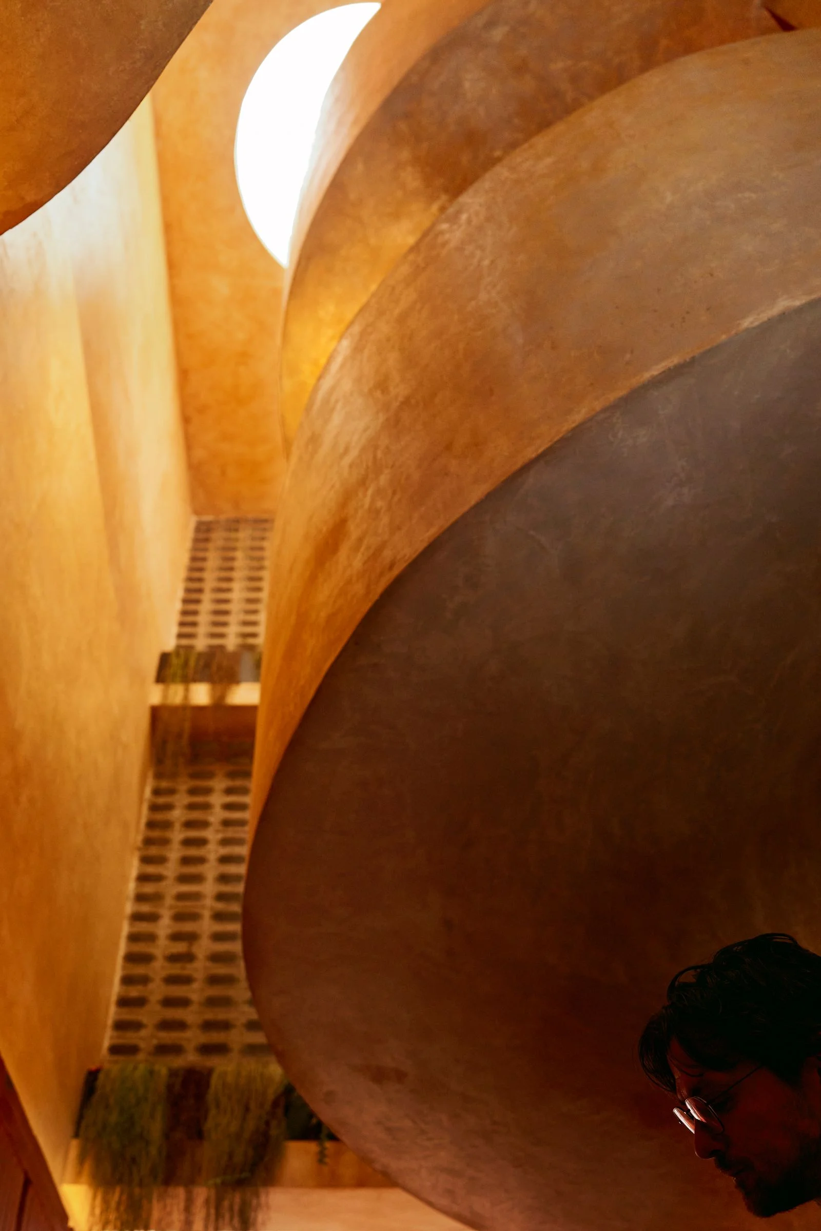 Image may contain City Adult Person Architecture Building Restaurant Staircase and Urban