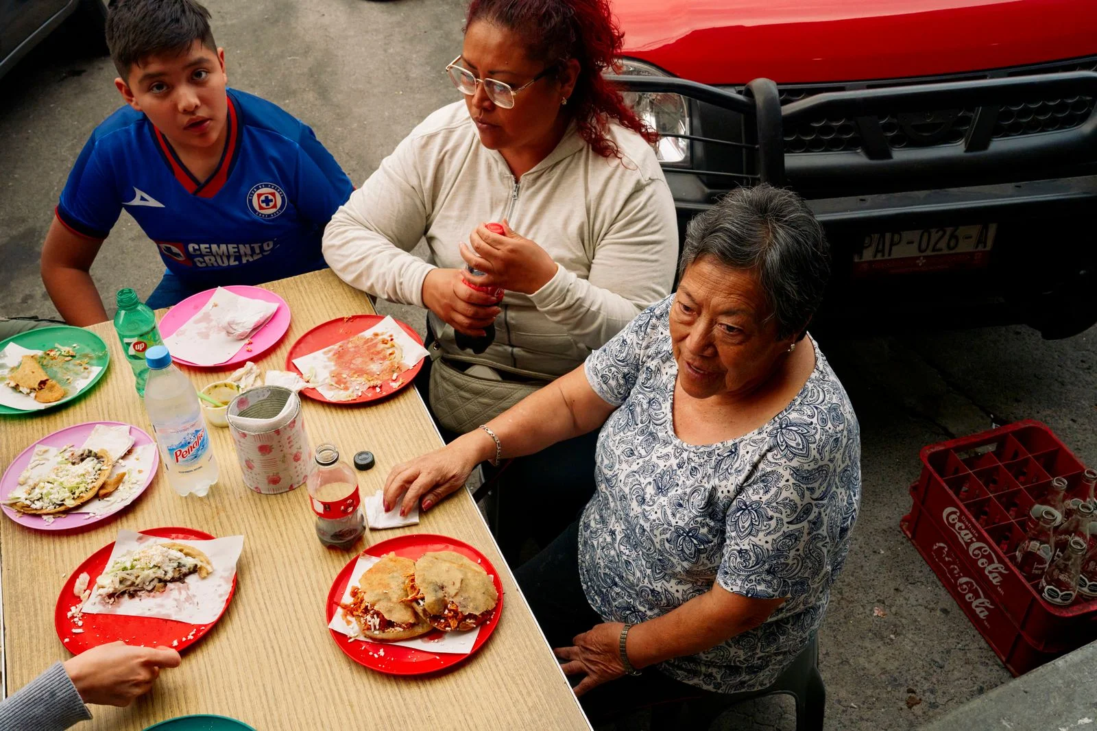 Image may contain Family Adult Person Food Gorditas Head Face and Child