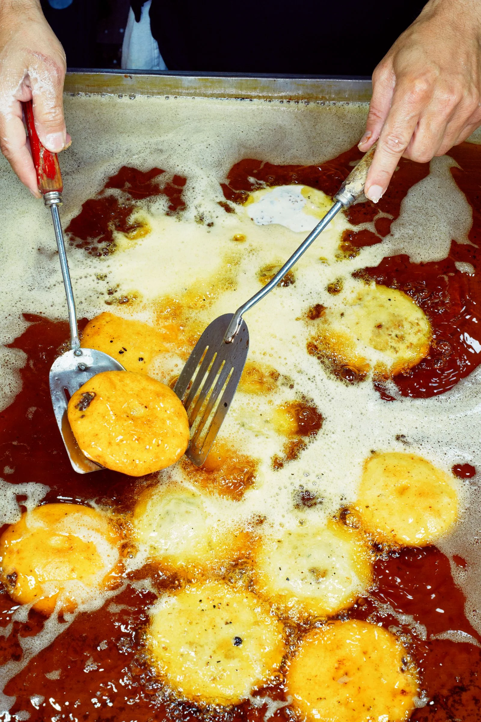 Image may contain Cooking Gorditas and Frying