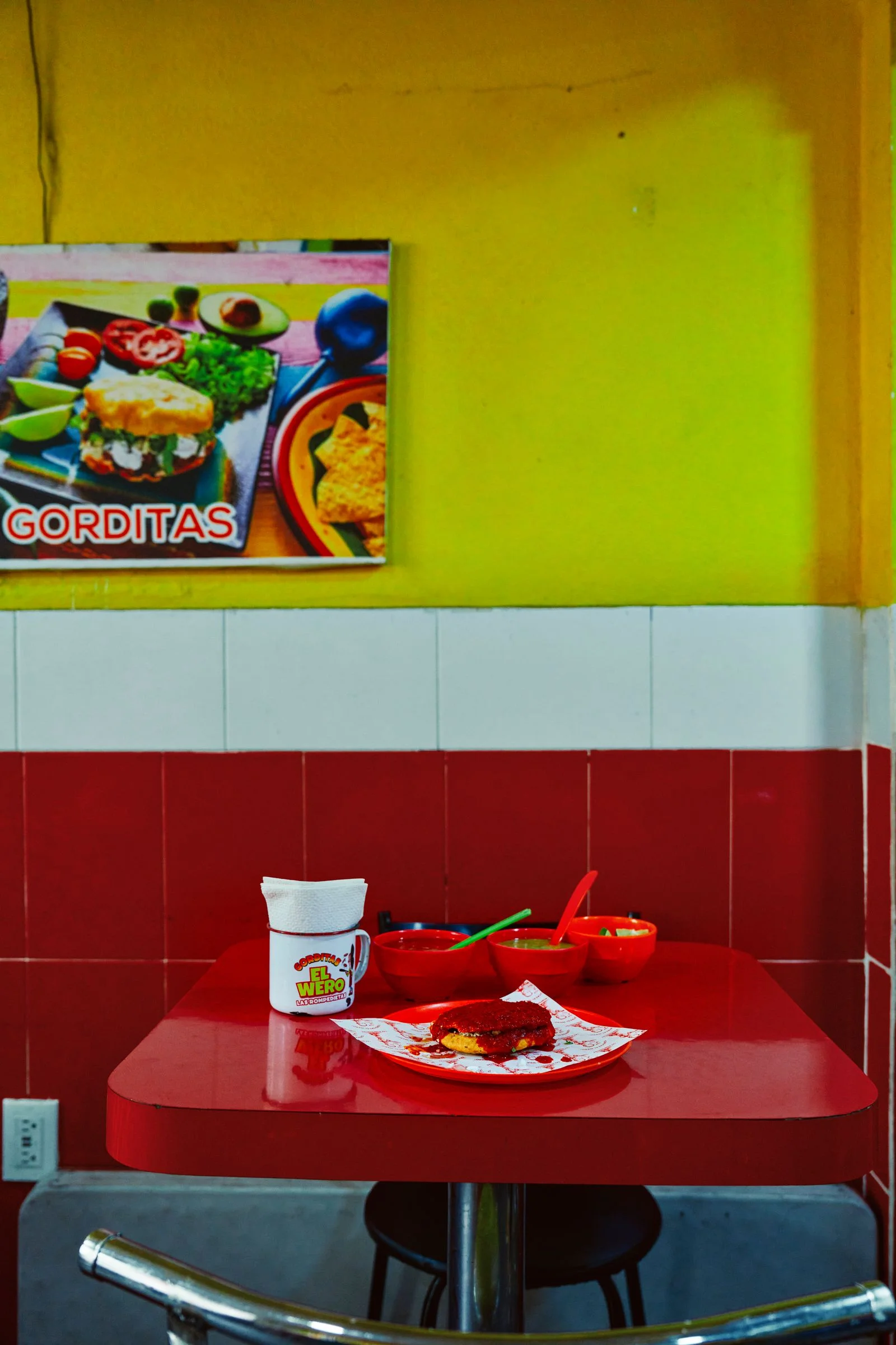 Image may contain Gorditas Food Furniture Table Dining Table Lunch Meal Bowl Cutlery Spoon Indoors and Restaurant