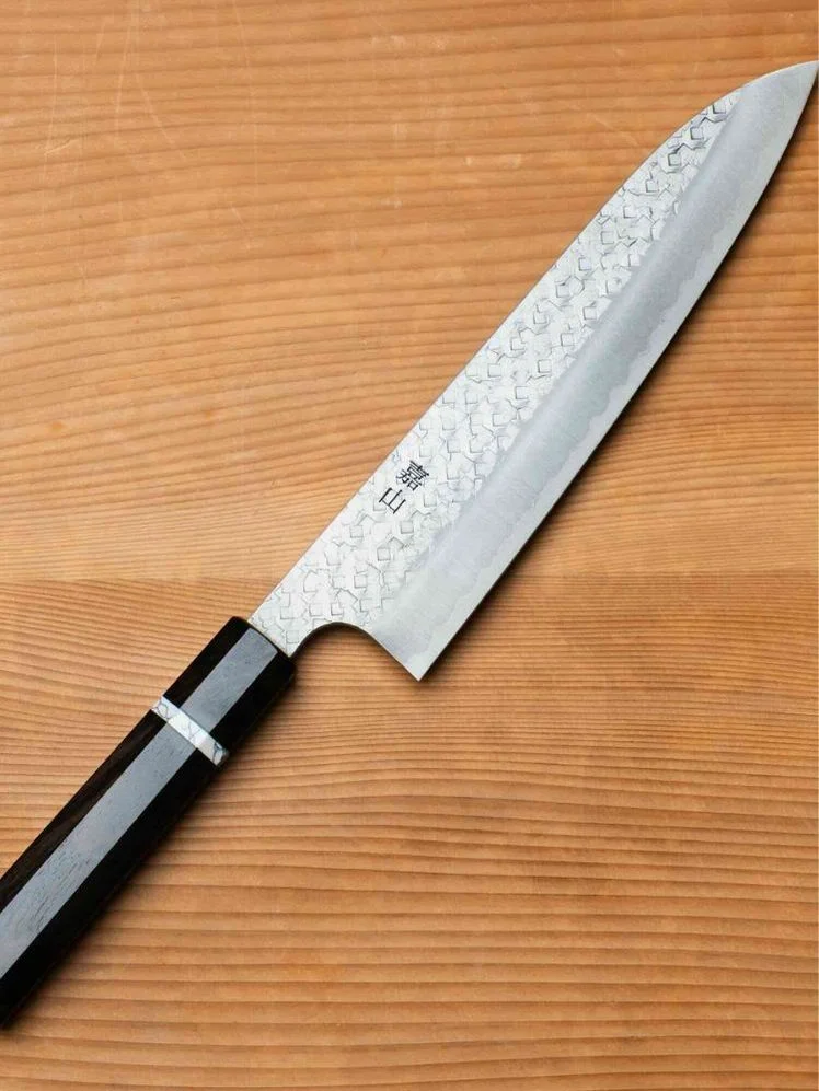 Image may contain: Blade, Weapon, Knife, and Dagger