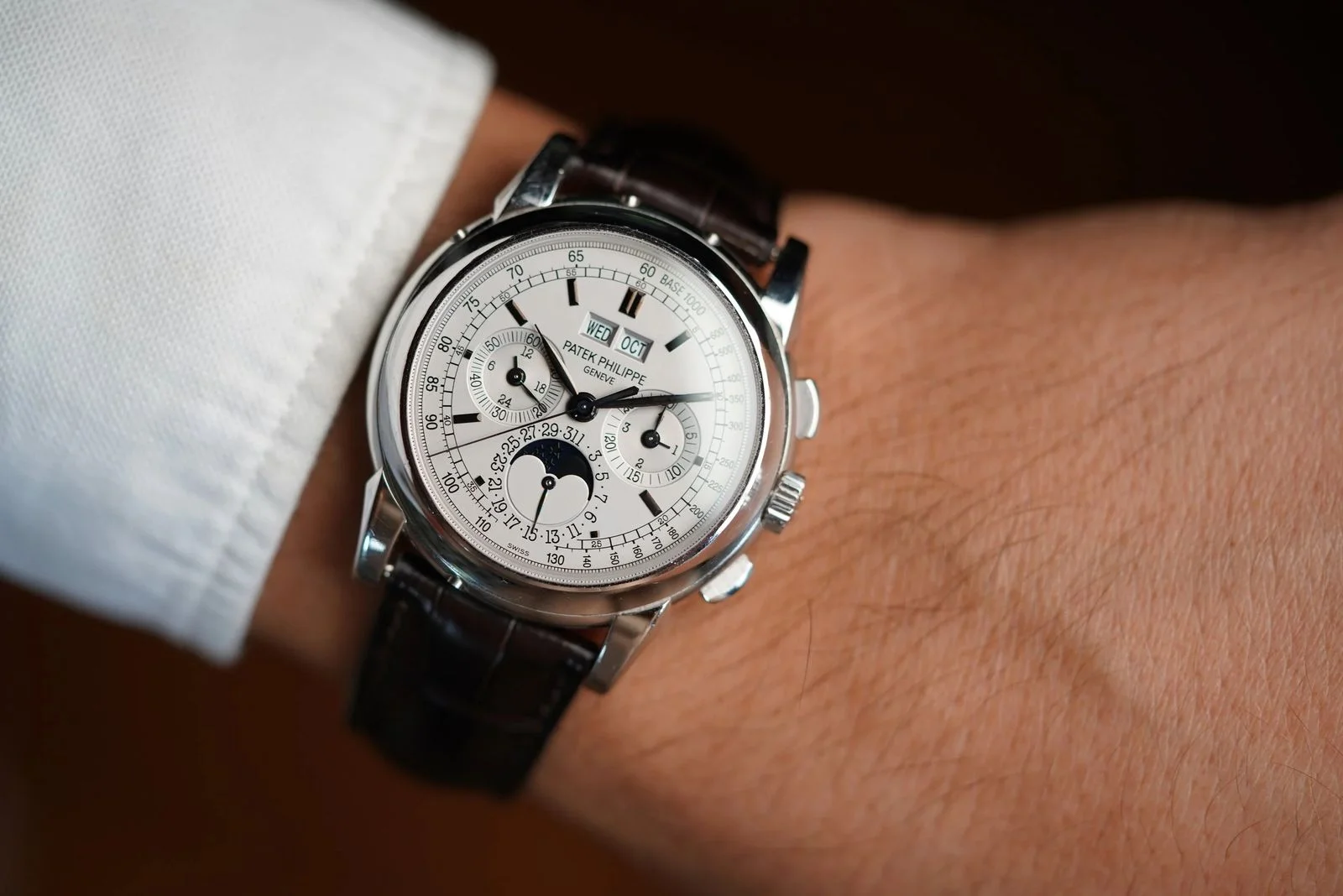 Image may contain Wristwatch Arm Body Part and Person